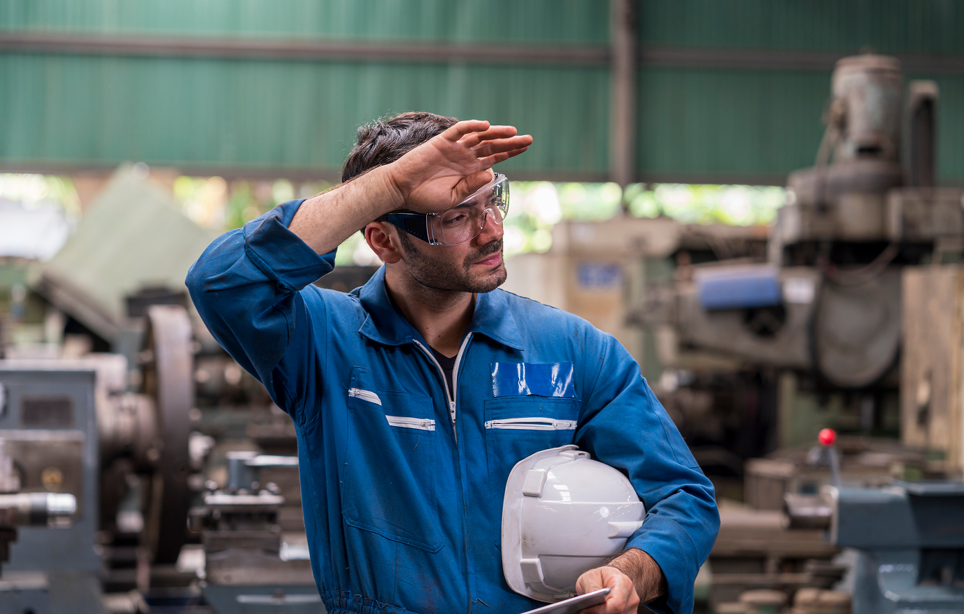 Worker stressed at manufacturing floor